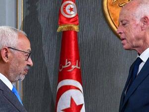 الرئيس التونسي قيس سعيد (يمين) وزعيم حركة النهضة راشد الغنوشي