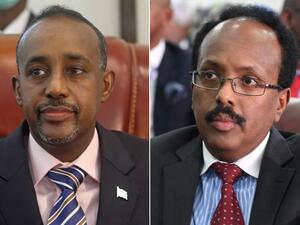 الرئيس الصومالي محمد عبد الله فرماجو (يمين) ورئيس الوزراء محمد حسين روبلي 