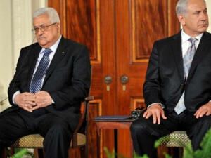 ارشيف_ رئيس الوزراء الاسرائيلي بنيامين نتنياهو (يمين) والرئيس الفلسطيني محمود عباس