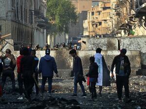 13 قتيلا في إطلاق نار على المتظاهرين في بغداد