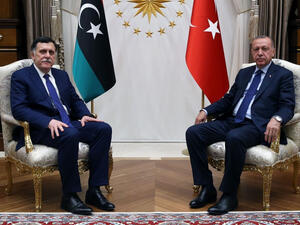 اردوغان خلال استقباله السراج في انقرة