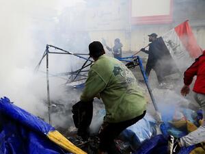  الشرطة العراقية اشتبكت مع محتجين في وسط بغداد