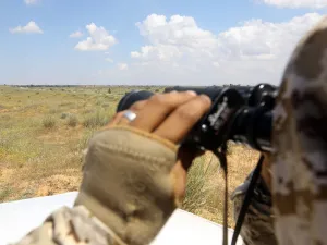 A fighter loyal to Libya's Government of National Accord (GNA) mans a position west of the city of Aziziah, some 60 kilometres southwest of the capital Tripoli (AFP)