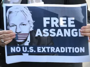 Placard calling for freedom for WikiLeaks founder Julian Assange (AFP)