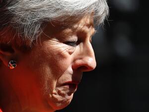 Britain's Prime Minister Theresa May reacts as she announces her resignation outside 10 Downing street in central London on May 24, 2019. Beleaguered British Prime Minister Theresa May announced on Friday that she will resign on June 7, 2019 following a Conservative Party mutiny over her remaining in power. Tolga AKMEN / AFP