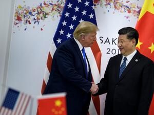 China's President Xi Jinping (R) greets US President Donald Trump before a bilateral meeting on the sidelines of the G20 Summit in Osaka on June 29, 2019.  Brendan Smialowski / AFP