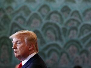 President Donald Trump listens as South Korean President Moon Jae-in speaks at the presidential Blue House in Seoul on June 30, 2019, before heading to the Demilitarized zone (DMZ) dividing the two Koreas.  Jacquelyn Martin / POOL / AFP