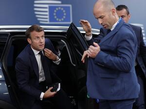 French President Emmanuel Macron arrives for the third straight day of a European Union leaders summit in Brussels on July 2, 2019, for talks aimed at defusing fresh power struggles in a bid to fill the bloc's top jobs.  GEOFFROY VAN DER HASSELT / AFP / POOL
