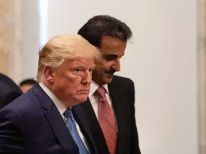 US President Donald Trump and Sheikh Tamim bin Hamad al-Thani, Emir of Quatar, take their seats at a dinner at the Treasury Department in Washington, DC, on July 8, 2019.  NICHOLAS KAMM / AFP