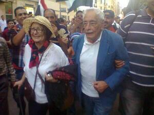 Gameel Rateb and Mohsena Tawfik protesting (Twitter)