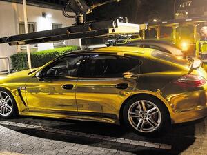 Motorist fined for driving shiny, gold Porsche (Twitter)