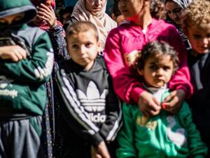 Syrian Kurds have repatriated 25 women and children from Iraq's Yazidi minority (AFP)