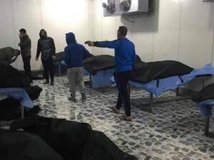 اشلاء قتلى الغارة الاميركية قبل دفنها 