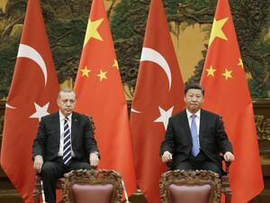 Turkish President Tayyip Erdogan, left, and Chinese President Xi Jinping /AFP