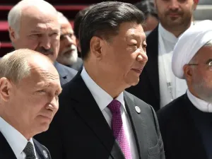 Russian President Vladimir Putin, Chinese President Xi Jinping and Iran's President Hassan Rouhani,  June 14 /AFP
