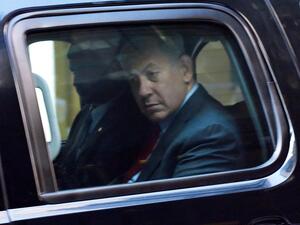 Israeli Prime Minister Benjamin Netanyahu is seen departing following a meeting with Republican presidential nominee Donald Trump on September 25, 2016 in New York. / AFP