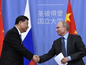  الرئيسي الروسي فلاديمير بوتين ونظيره الصيني شي جين بينغ