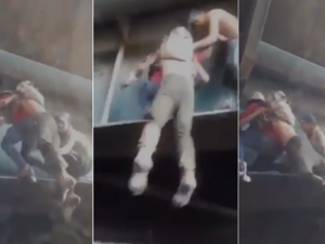 الفيديو يظهر متظاهرا عراقيا وهو ينقذ أحد الجرحى على جسر الجمهورية