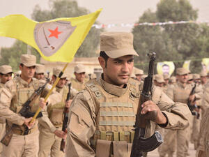 مسلحون من وحدات حماية الشعب الكردية