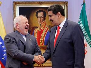 الرئيس الفنزويلي نيكولاس مادورو مع وزير الخارجية الإيراني محمد جواد ظريف