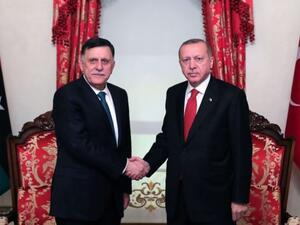 الرئيس التركي رجب طيب أردوغان، ورئيس المجلس الرئاسي لحكومة الوفاق الليبية فائز السراج