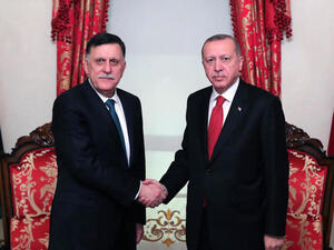 الرئيس التركي أردوغان ورئيس حكومة الوفاق السراج