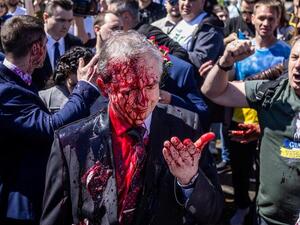 Russia's Ambassador to Poland Splattered With Red Paint
