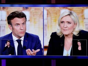 Macron Warns Le Pen She Risks ‘Civil War’ by Banning Hijab