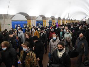 In Pictures: Ukrainians Flee, Take Shelter After Invasion 