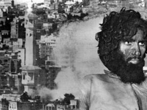 Smoke rises during fighting on Nov. 20, 1979, after a group seized the Holy Mosque. Right: The mastermind of the attack, Juhayman Al-Otaibi. (AFP)