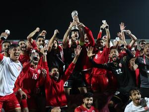 Bahrain's players celebrate after winning the 24th Arabian Gulf Cup Final against Saudi Arabia at the Khalifa International Stadium in the Qatari capital Doha on December 8, 2019. KARIM JAAFAR / AFP