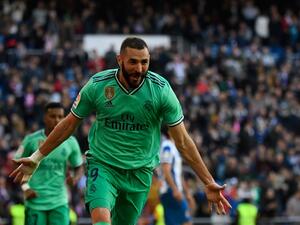  Raphael Varane and Karim Benzema grabbed the goals as Real Madrid saw off Espanyol at the Santiago Bernabeu. 