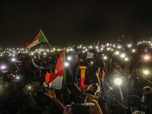 Sudanese protesters open their smartphones lights during a protest outside the army headquarters in the capital Khartoum on April 21, 2019. (AFP/ File Photo)