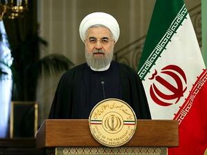 Iranian President Hassan Rouhani speaks during a press-conference following a meeting his Swiss counterpart in the capital Tehran. (AFP/ATTA KENARE)