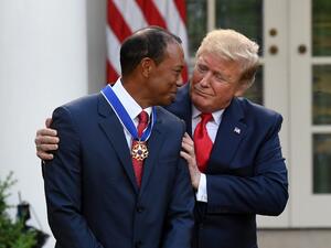 US President Donald Trump presents US golfer Tiger Woods with the Presidential Medal of Freedom during a ceremony in the Rose Garden of the White House in Washington, DC, on May 6, 2019.  (SAUL LOEB / AFP)
