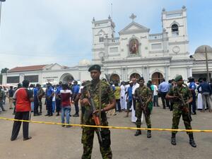 Sri Lankan security personnel keep watch outside the church premises following a blast at the St. Anthony's Shrine in Kochchikade, Colombo on April 21, 2019. (ISHARA S. KODIKARA / AFP)