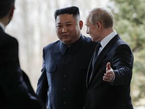 Russian President Vladimir Putin welcomes North Korean leader Kim Jong Un prior to their talks at the Far Eastern Federal University campus on Russky island in the far-eastern Russian port of Vladivostok on April 25, 2019.  (Alexander Zemlianichenko / POOL / AFP)