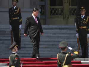 China's President Xi Jinping (C) arrives to attend a welcoming ceremony for Mongolia's President Khaltmaagiin Battulga (not pictured) at the Great Hall of People in Beijing on April 25, 2019. (AFP)