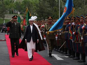 Afghan President Ashraf Ghani (C), inspects a guard of honor during the first day of the Loya Jirga, or the consultative council in Kabul, on April 29, 2019. (AFP/ File Photo)