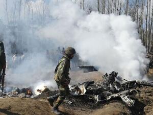 Indian soldiers inspect the remains of an Indian Air Force helicopter after it crashed in Budgam district, outside Srinagar. (Tauseef Mustafa/AFP/Getty)