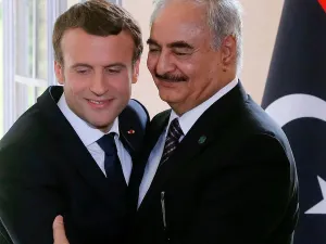 President Emmanuel Macron and Field Marshal Khalifa Haftar, together in 2017. (Jacques Demarthon / AFP)