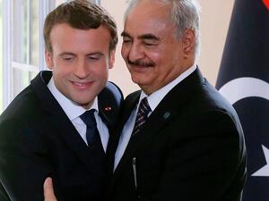 President Emmanuel Macron and Field Marshal Khalifa Haftar, together in 2017. (Jacques Demarthon / AFP)