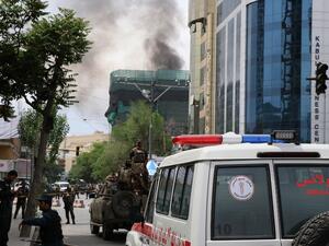 Smoke billows from a building during an ongoing attack by Taliban militants on a compound housing and international aid organisation in Kabul on May 8, 2019. (AFP/ File)