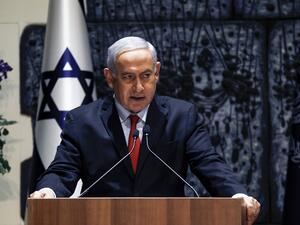Israeli Prime Minister Benjamin Netanyahu makes an address at the president's residence in Jerusalem on April 17, 2019. (MENAHEM KAHANA / AFP)