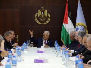 Palestinian President Mahmud Abbas (C) gestures during his meeting with the newly announced government in the Israeli-occupied West Bank town of Ramallah, on April 13, 2019. (Fadi AROURI / POOL / AFP)