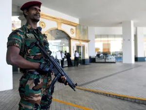 Sri Lankan soldier stands guard at the entrance of the Cinnamon Grand hotel lobby in Colombo. (AFP/ File Photo)