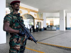 Sri Lankan soldier stands guard at the entrance of the Cinnamon Grand hotel lobby in Colombo. (AFP/ File Photo)