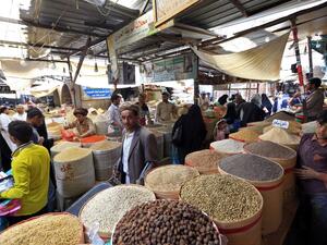 Yemenis shop in a market in the old city of the capital Sanaa, as the faithful prepare for the Muslim holy fasting month of Ramadan, on May 2, 2019. (AFP)