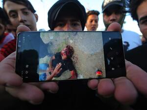 Iraqi security forces said "unidentified snipers" killed four people across the capital Baghdad today, the fourth day of violent anti-government protests. AHMAD AL-RUBAYE / AFP