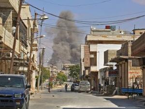 Smoke rises 4 kilometres east of Khan Shaykhun in the southern countryside of Idlib province. (Anas/AFP/Getty Images)